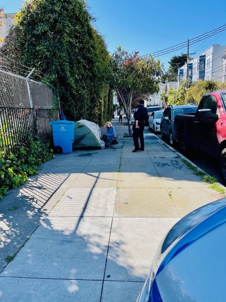 Security guard homeless encampment action